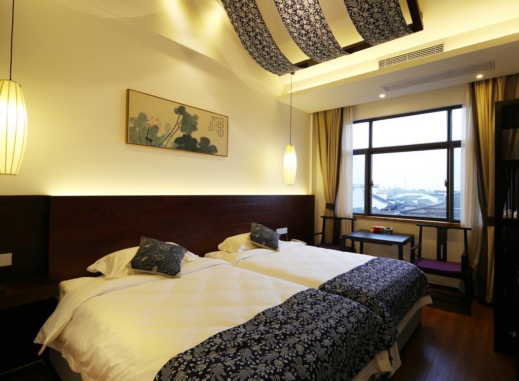 Floral Hotel - Yuexiang Inn Wuzhen Jiaxing Esterno foto